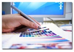 a graphic designer is looking at a color palette, choosing best colr for his next design. We can see a computer screen in the background